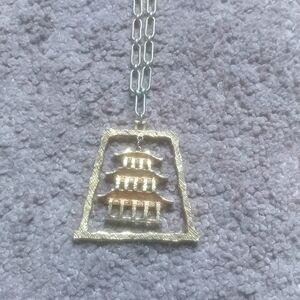 Asian dwelling pendant necklace